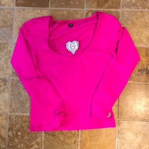 Hot pink long sleeve top with heart embellishment